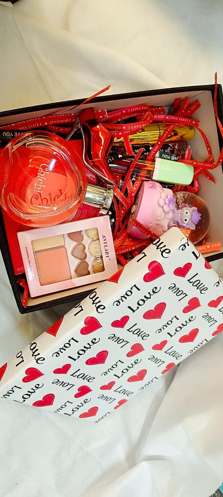 پک ویژه روز زن همراه ادکلن گوی مینی ریمل تینت هایلایتر همراه جعبه کادوییsad