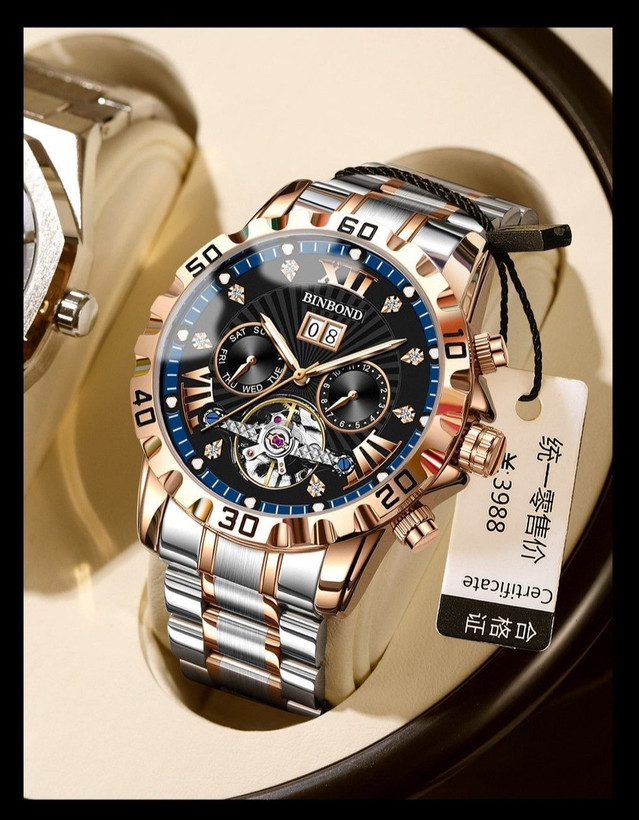 ☑️BIN BOND 《highe quality》 Original watch ⌚️ ابهت، قدرت و ظرافت... همه در یک قاب. مناسب آقایان صفحه چشم نواز با جزئیات حرفه ای موتور پر قدرت اتوماتیک روز شمار ایام هفته موتورهای فعال نمایش اسکلتون مناسب استایل رسمی و روز مره مقاوم دربرابر آب برندشرکتی اوریجینال کارت گارانتی بند استیل فولاد شیشه سافایر صفحه لومینوس(شب نما) قفل دو پروانه